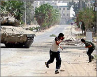 Images of children taking on tanks has turned public opinion but not international political will