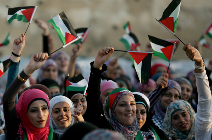 Graduates in Jenin bear flags