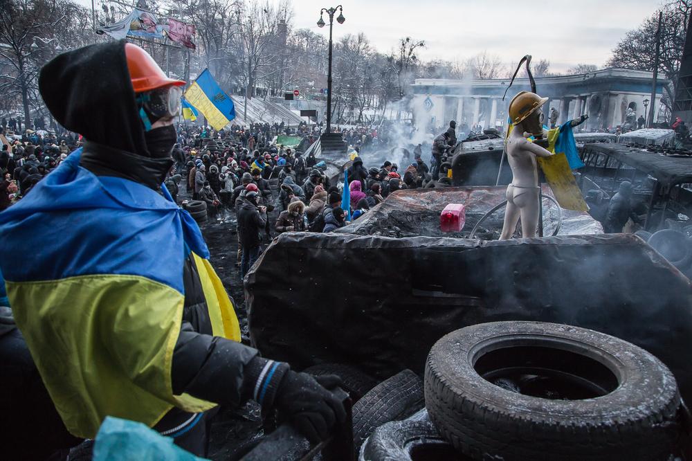 Following deadly clashes, security forces and protesters in Kiev are observing a temporary truce.