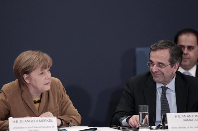 Merkel's visit sought to mark the economic upturn of a nation whose economy has been in the doldrums [Reuters]