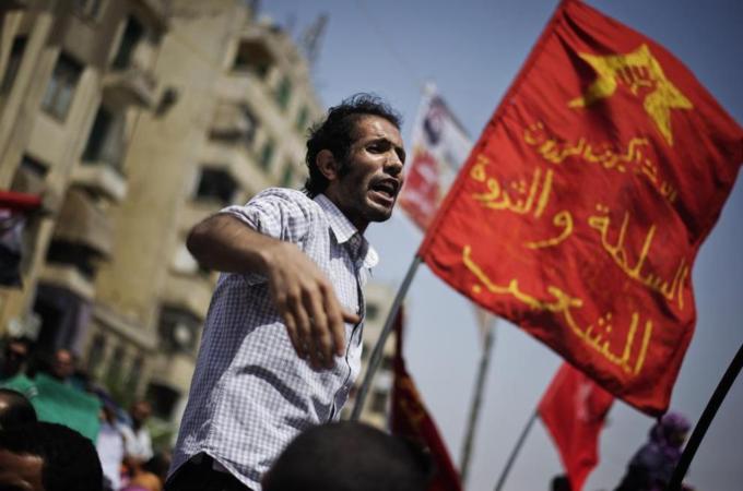 Years of gradually increasing contempt among workers have been mostly apolitical, in demand for better livings [AFP]