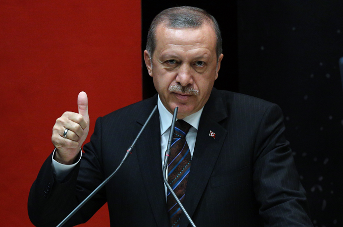 Analysts say President-elect Recep Tayyip Erdogan will pass constitutional amendments to strengthen the post [AP]