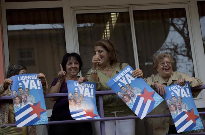 The three Cubans imprisoned in the US who were sent home were part of a group of five who were spying on Cuban-Americans viewed as threatening by Cuba, writes McCoy [AP]