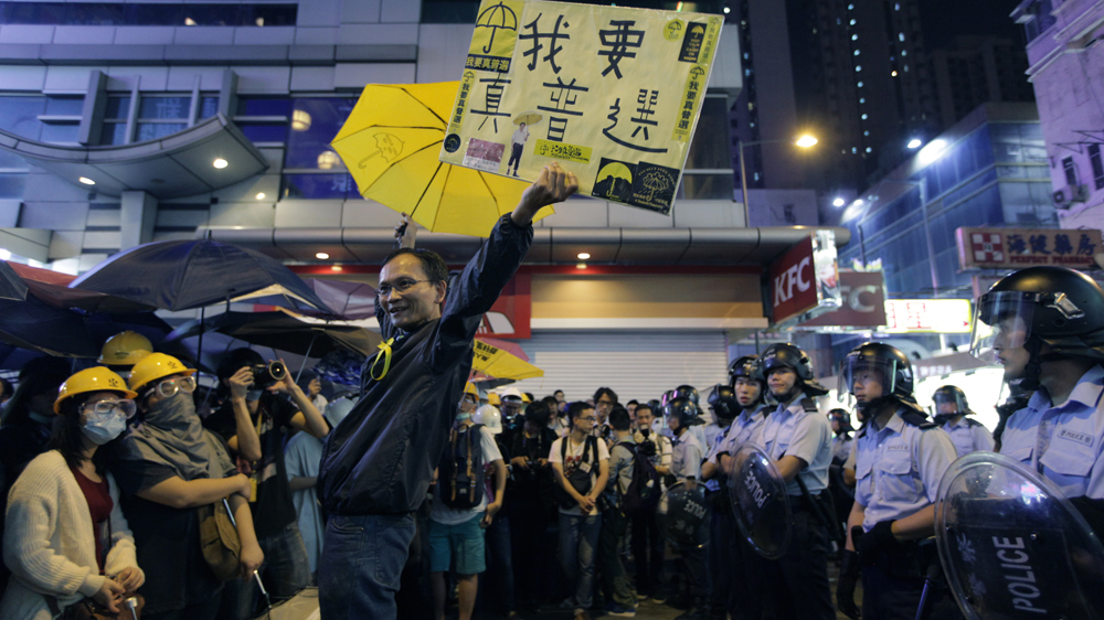 Over the summer and autumn of 2014, thousands of Hong-Kongers went to the street to demand free elections [Lee Xian Jie / Al Jazeera] 