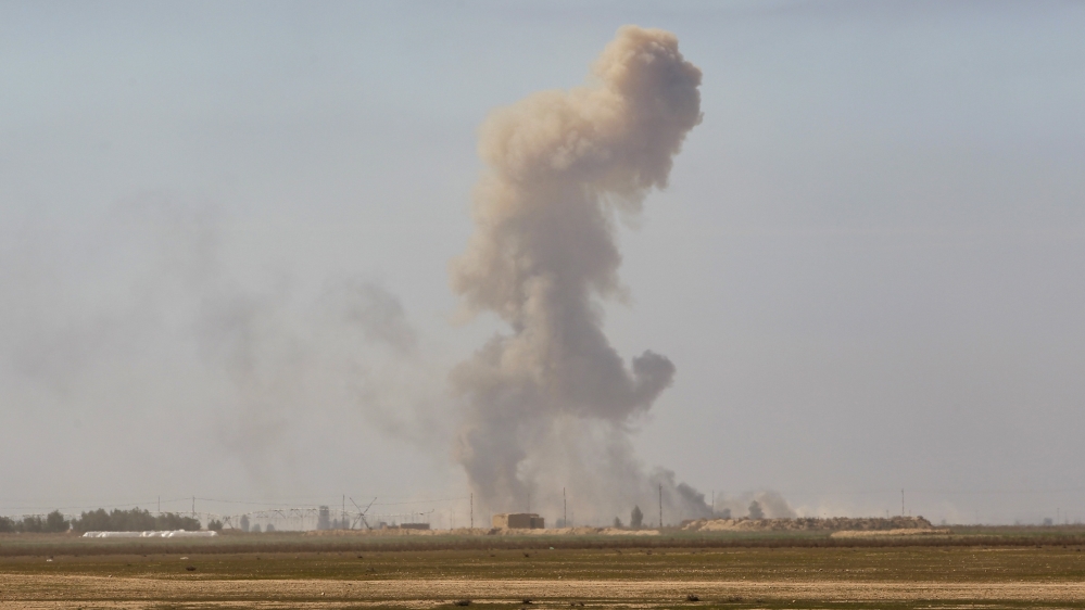 Smoke rise during clashes with Islamic State militants at the town of Tal Ksaiba near the town of al-Alam