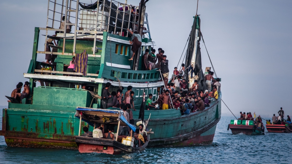 Rohingya migrants resting on a boat off the coast near Kuala Simpang Tiga in Indonesia''s East Aceh district of Aceh province before being rescued [AFP]