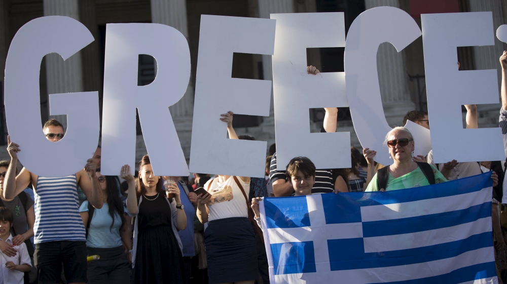 Demonstrators in London gather to protest against the European Central Bank''s handling of Greece''s debt repayments