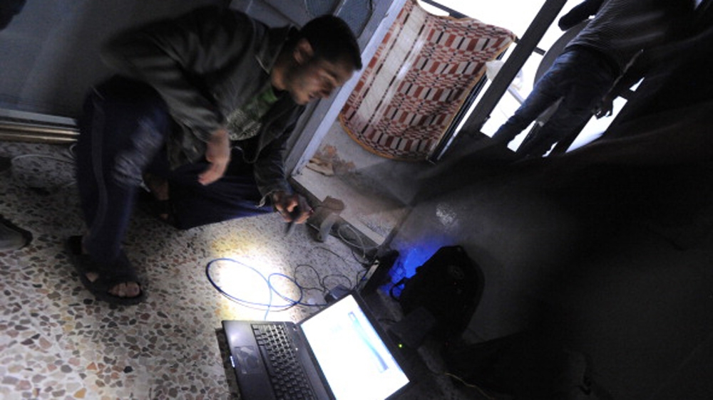Anti-government Syrian media activists set up an illegal internet satellite to upload photos and video of the destruction by government shelling and bombardment [Getty]