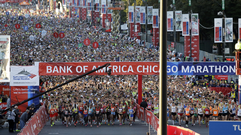 Runners start the Chicago Marathon in Chicago, Sunday, Oct. 13, 2013. (AP Photo/Nam Y. Huh)