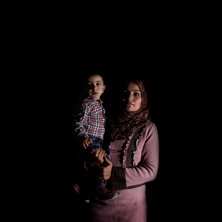 Sana is a Palestinian Refugee from Syria (PRS). She is 22 and came from Damascus in 2013. She lives with her family in a Palestinian camp in Tripoli, north Lebanon. The family lost almost all of their documents when their house in Syria was destroyed. In Lebanon, there are limited services for PRS people. Sana’s son Khaled is now a year old and the family is trying to obtain a birth certificate for him   [Felipe Jacome/Al Jazeera] 