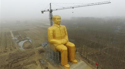 The 37-metre statue, which towers over empty fields, cost $460,000 to construct, according to local reports [Reuters]  