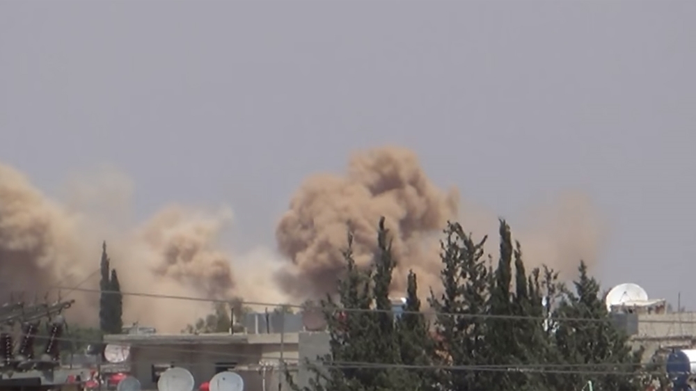 Khan Eshieh being hit by barrel bombs