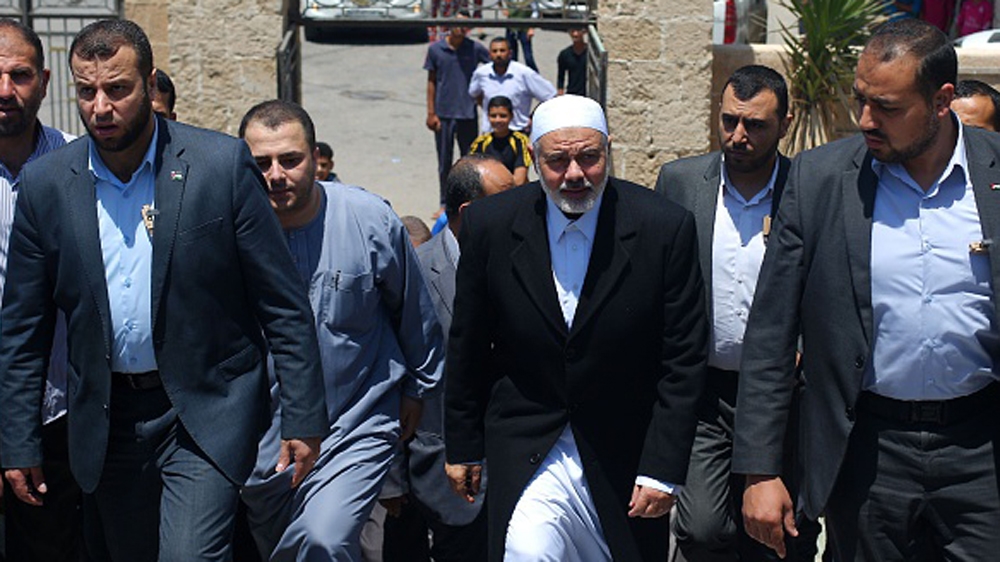 Hamas'' chief, Ismail Haniya arrives at a mosque after giving a speech during the Friday prayer [AFP]