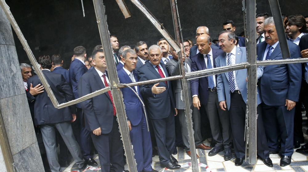 Turkey''s Prime Minister Yildrim visits damaged parts of Turkish parliament in Ankara