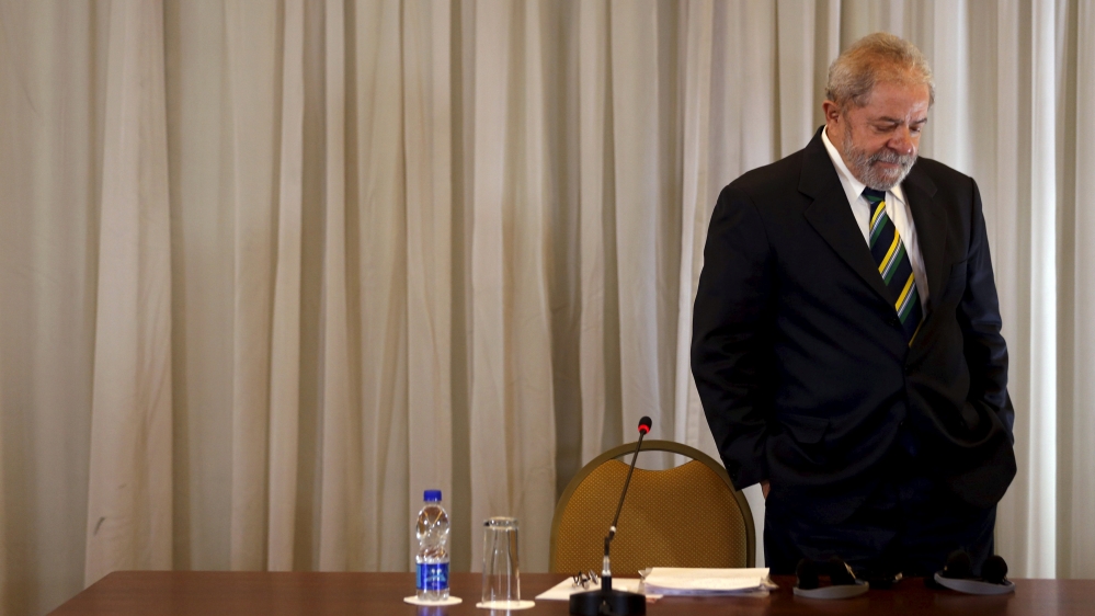 Former Brazilian President Lula da Silva arrives to a news conference with international media in Sao Paulo