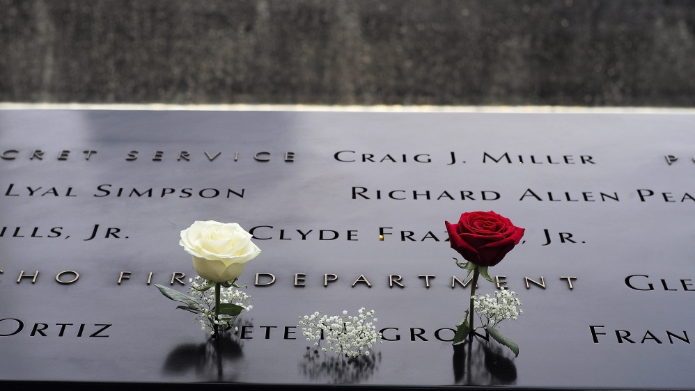 Flowers posted in the names of the victims on the edges of the 9/11 Memorial, where Pope Francis will visit later in the day in New York, New York [EPA]