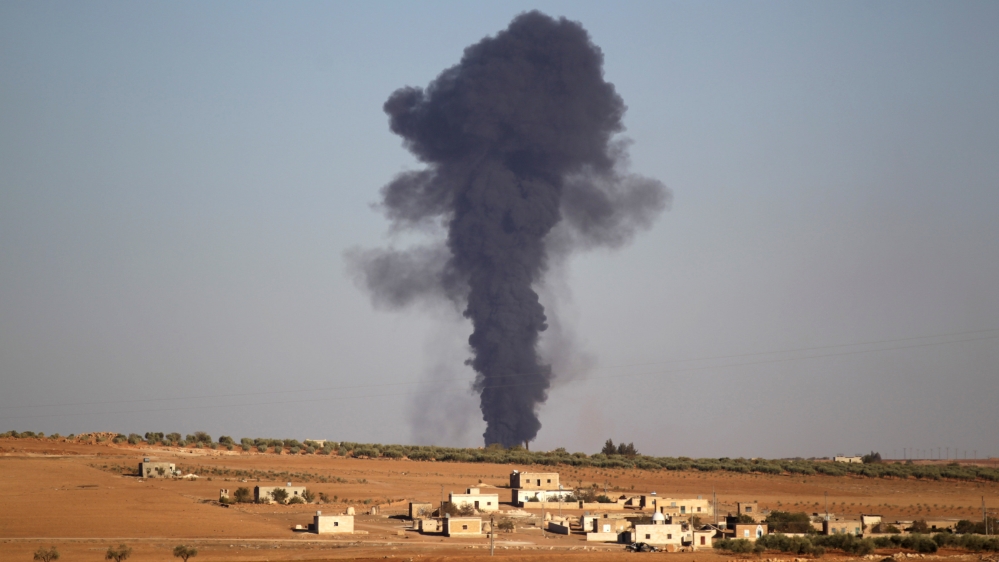Smoke rises from al-Bab city, northern Aleppo province, Syria [REUTERS]