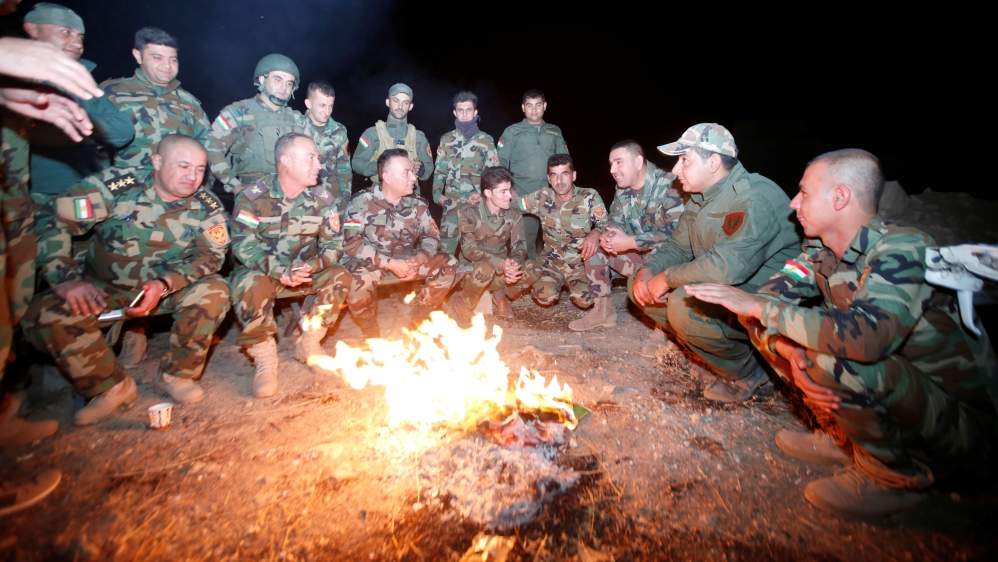 Peshmerga forces east of Mosul during preparations for the offensive [Azad Lashkari/Reuters]