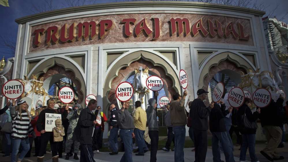 Union members from UNITE HERE Local 54 rally outside the Trump Taj Mahal Casino in Atlantic City, New Jersey