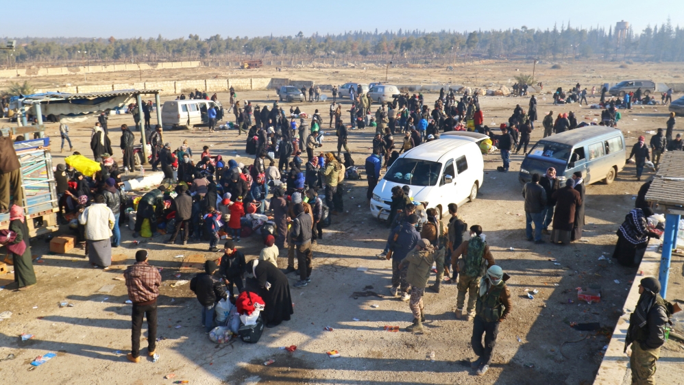 Evacuees from a rebel-held area of Aleppo arrive at insurgent-held al-Rashideen