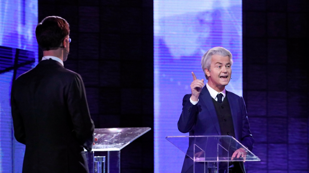 Dutch far-right politician Geert Wilders of the PVV party and Dutch Prime Minister Mark Rutte of the VVD Liberal party take part in the "EenVandaag" debate in Rotterdam