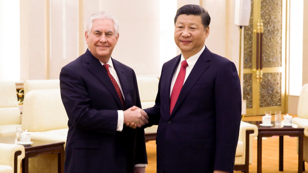 China''s President Xi Jinping shakes hands with U.S. State of Secretary, Rex Tillerson at the Great Hall of the People in Beijing