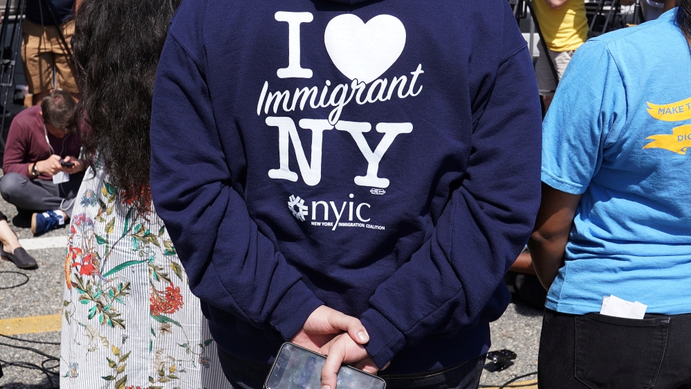 Immigration advocate Awawdeh speaks during a news conference to address the incoming travel ban to the U.S., at John F. Kennedy airport in the Queens borough of New York City