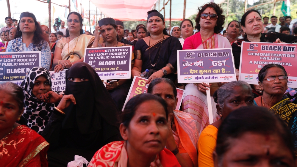 Supporters of India''s main opposition Congress party shout attend protest to mark a year since demonetisation was implemented by Prime Minister Narendra Modi in Mumbai