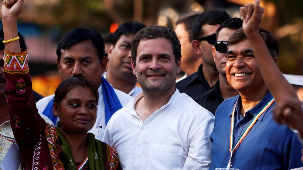 Rahul Gandhi, Vice-President of India''s main opposition Congress Party, poses with his supporters during a rally ahead of Gujarat state assembly elections, at a village on the outskirts of Ahmedabad