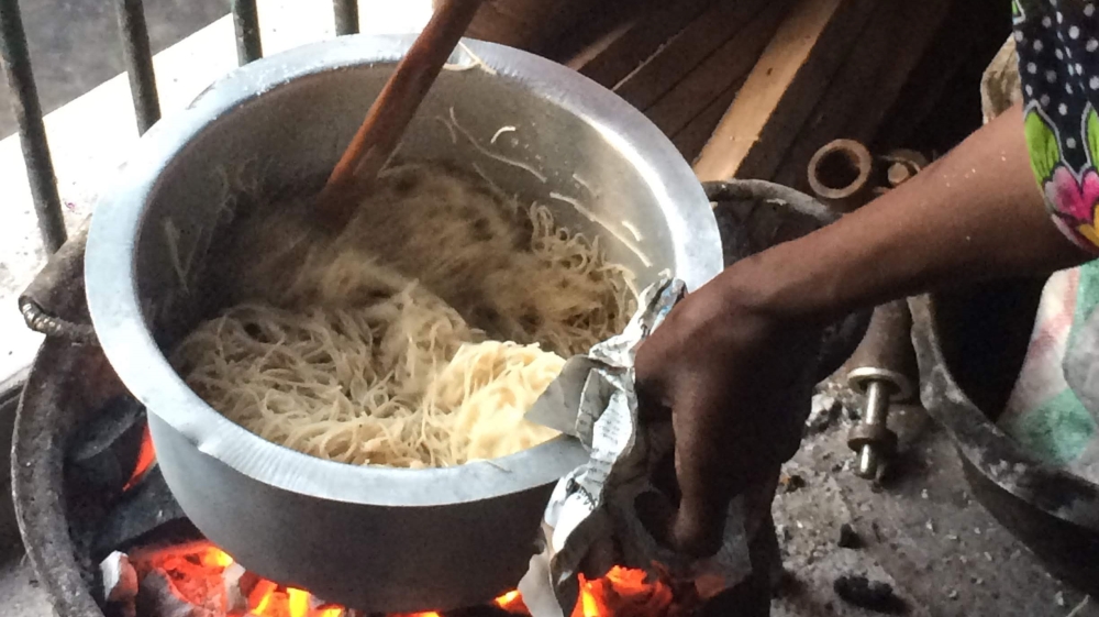 The team produces a year's worth of noodles during peak tambi season [Amanda Leigh Lichtenstein/Al Jazeera]