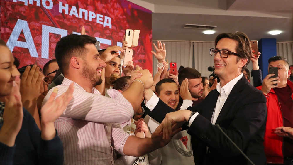 Presidential candidate of the ruling SDSM Stevo Pendarovski greets supporters as he celebrates after preliminary results during the presidential election in Skopje, North Macedonia May 5, 2019. REUTER