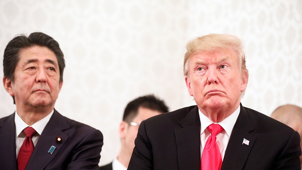 U.S. President Donald Trump and Japan''s Prime Minister Shinzo Abe meet with family members of people abducted by North Korea, at Akasaka Palace in Tokyo, Japan May 27, 2019. REUTERS/Jonathan Ernst