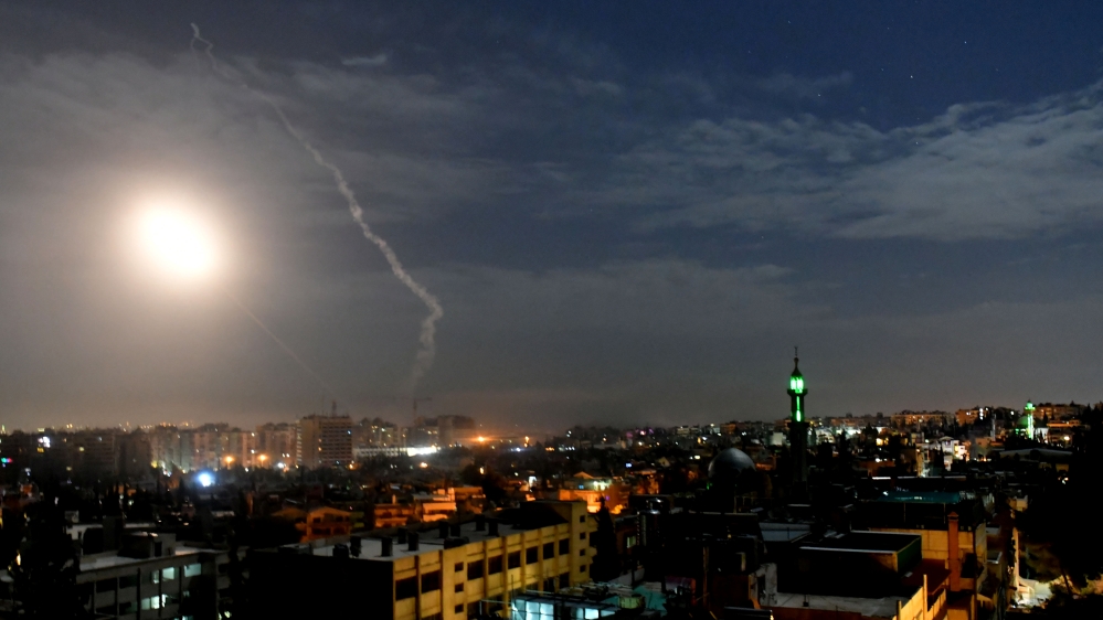 Missile fire is seen over Damascus