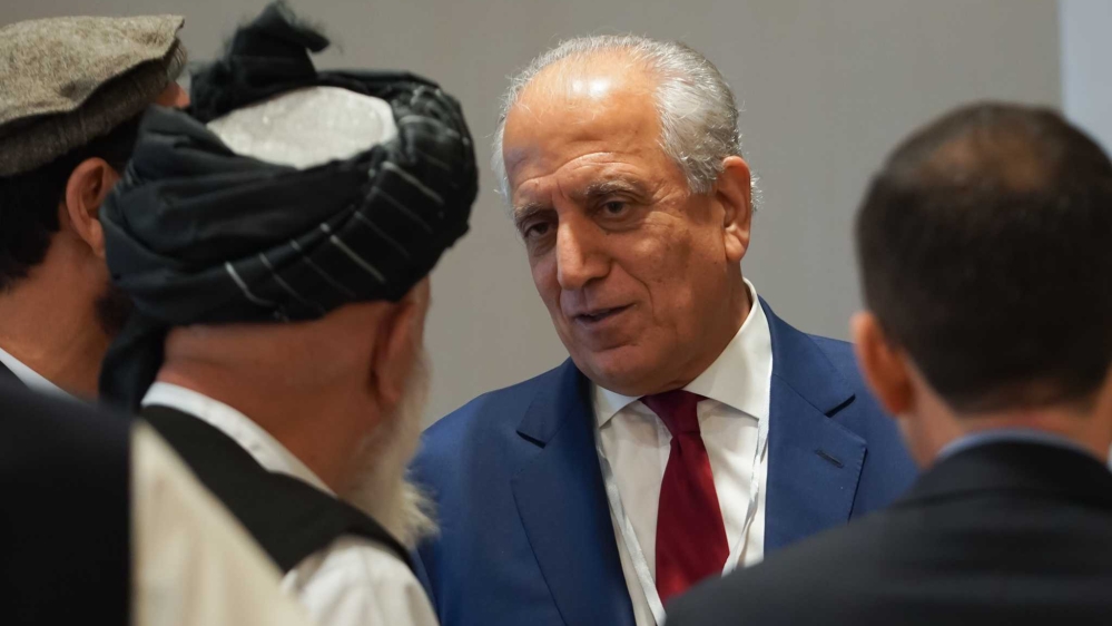 U.S envoy Zalmay Khalilzad with some of the delegates [Sorin Furcoi/Al Jazeera]