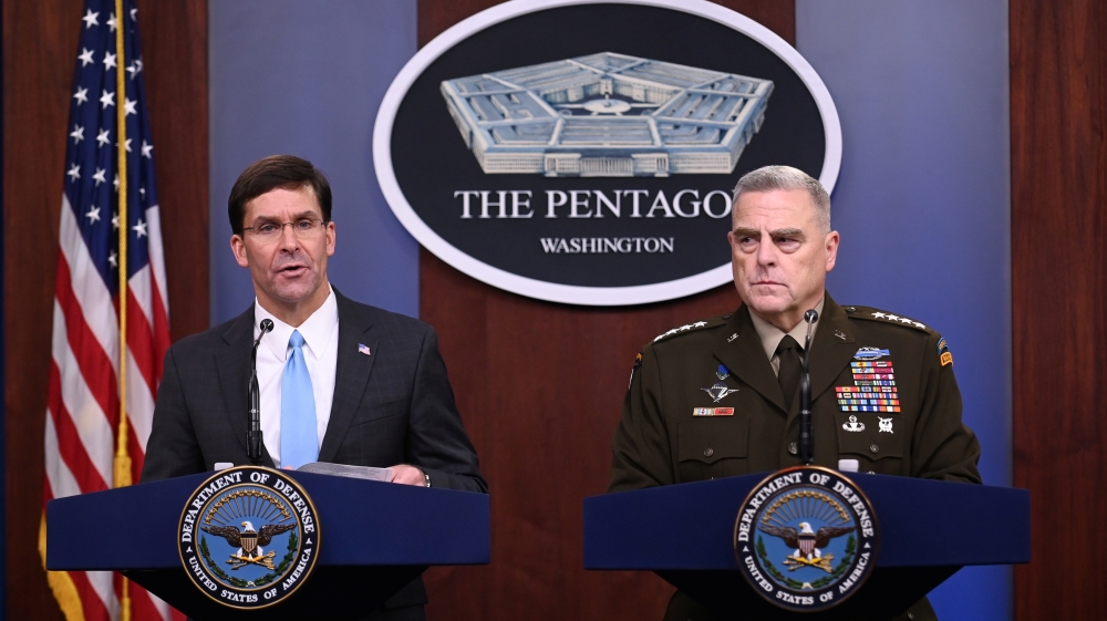 U.S. Defense Secretary Mark Esper and Joint Chiefs Chairman General Mark Milley address reporters during a media briefing at the Pentagon in Arlington, Virginia, U.S., October 11, 201