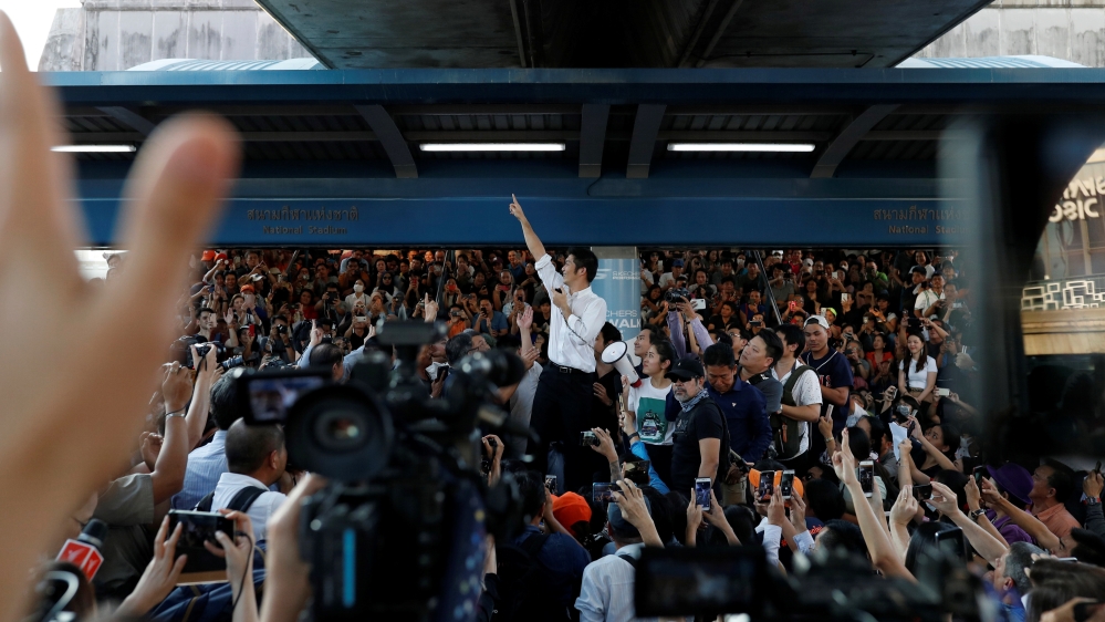 Thanathorn of Thailand''s progressive Future Forward Party gestures to his supporters at a sudden unauthorised rally in Bangkok