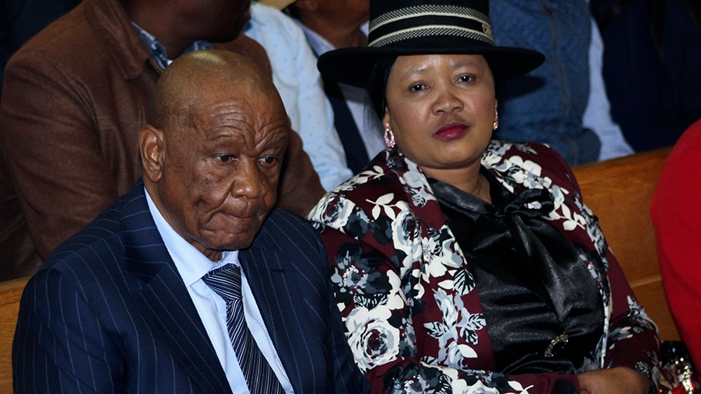 Lesotho’s former Prime Minister, Thomas Thabane, left, and his wife Maesaiah, right, in court in Maseru, Monday, Feb. 24, 2020. Thabane appeared in court but the murder case against him failed to proceed as