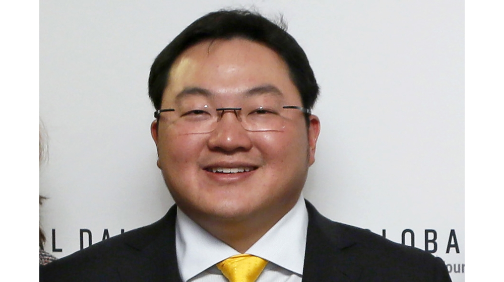 In this April 23, 2015 file photo, Jho Low, Director of the Jynwel Foundation, poses at the launch of the Global Daily website in Washington, D.C. The U.S. has returned $300 million to Malaysia that p