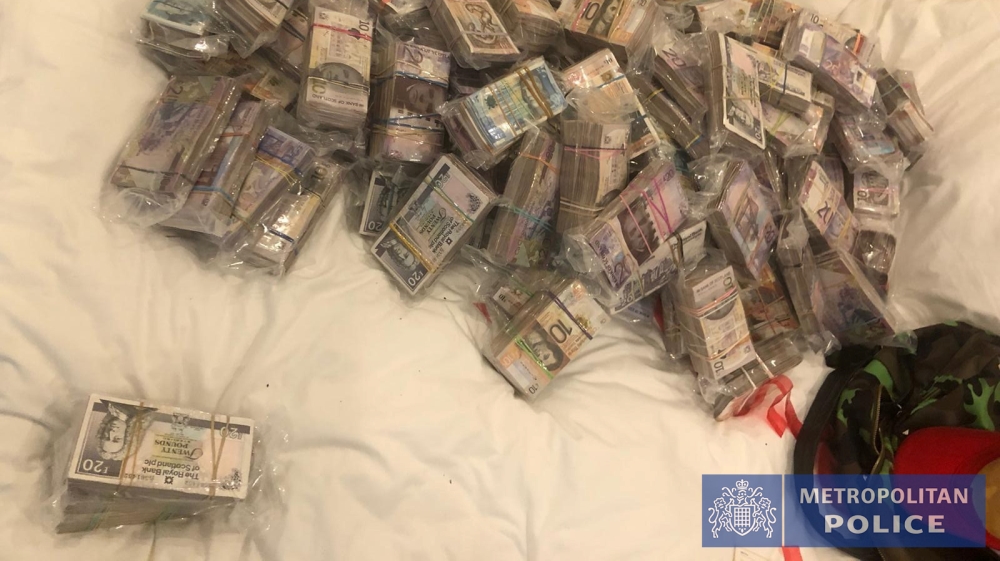 Bundles of cash are displayed