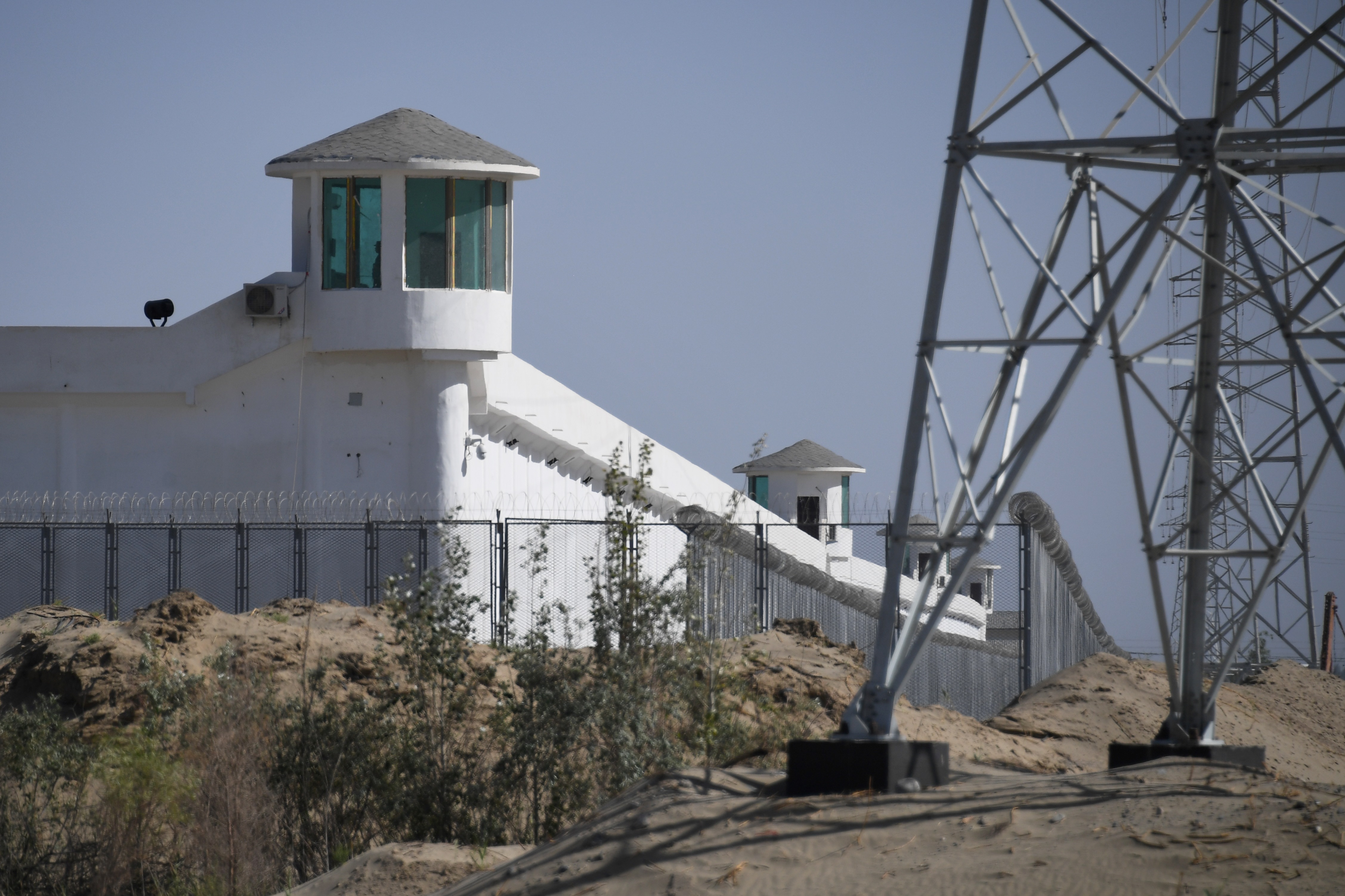 watchtowers on a high-security facility near what is believed to be a re-education camp in Xinjiang