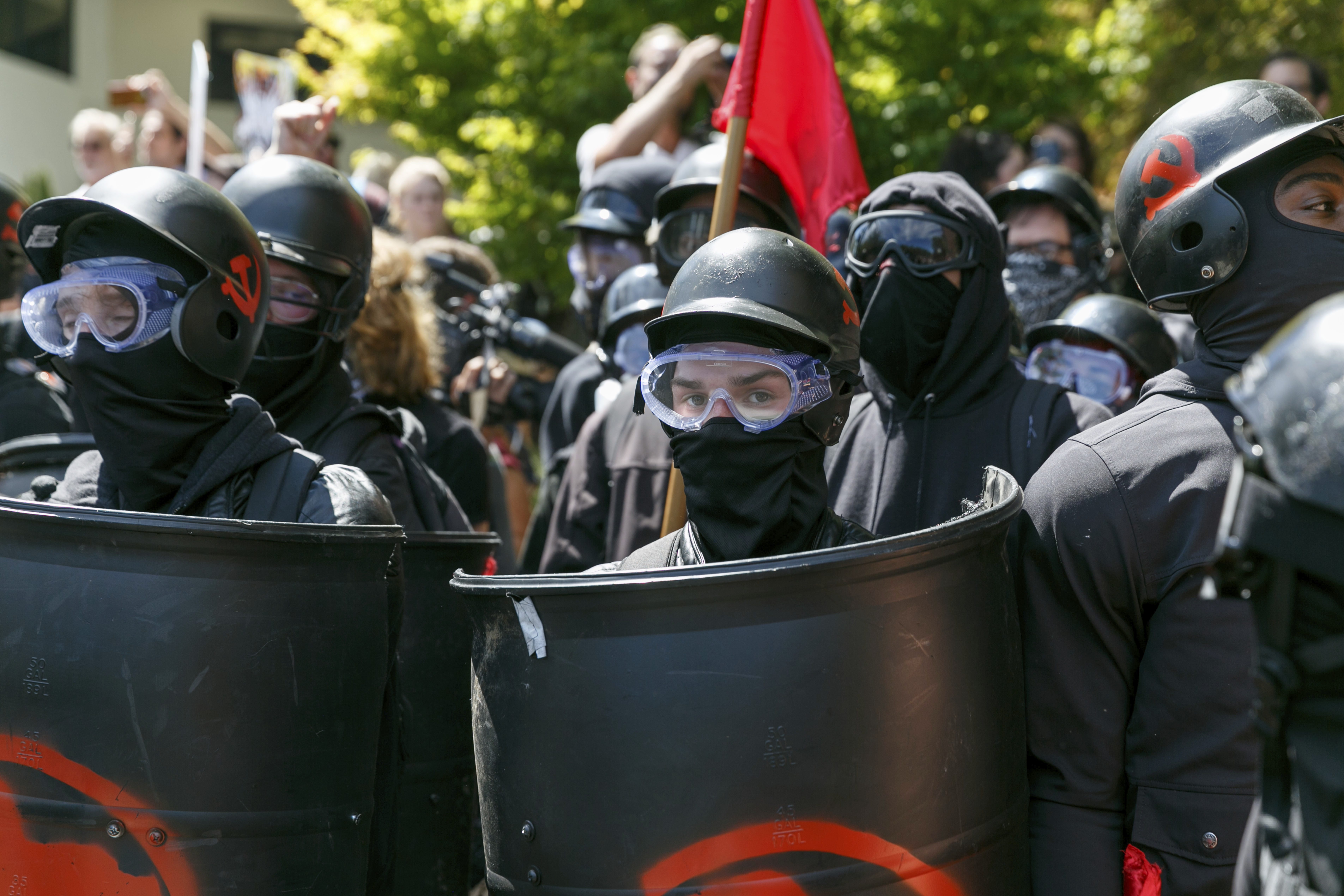 Counterdemonstrators prepare to face off against far right Patriot Prayer protesters during a rally in Portland, Oregon in 2018 [John Rudoff/AP Photo]