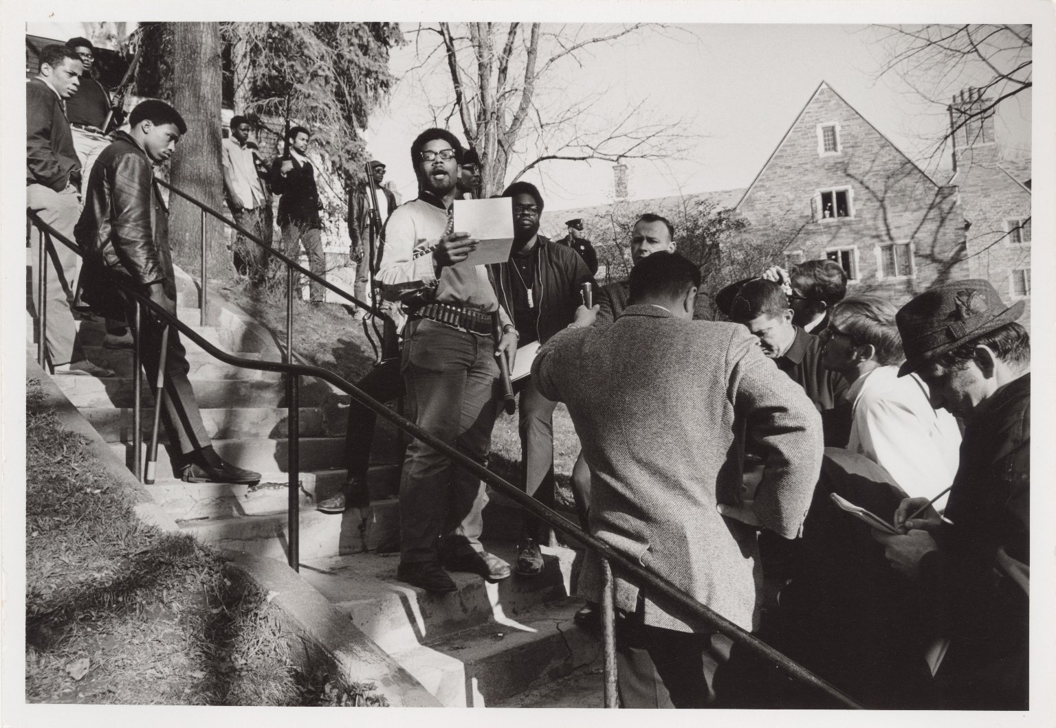 April 20, 1969: Cornell University student leader Eric Evans reads a statement after members of the Afro-American Society occupied Willard Straight Hall to protest against the university&#39;s perceived racism [Photo courtesy of Division of Rare and Manuscript Collections, Cornell University]