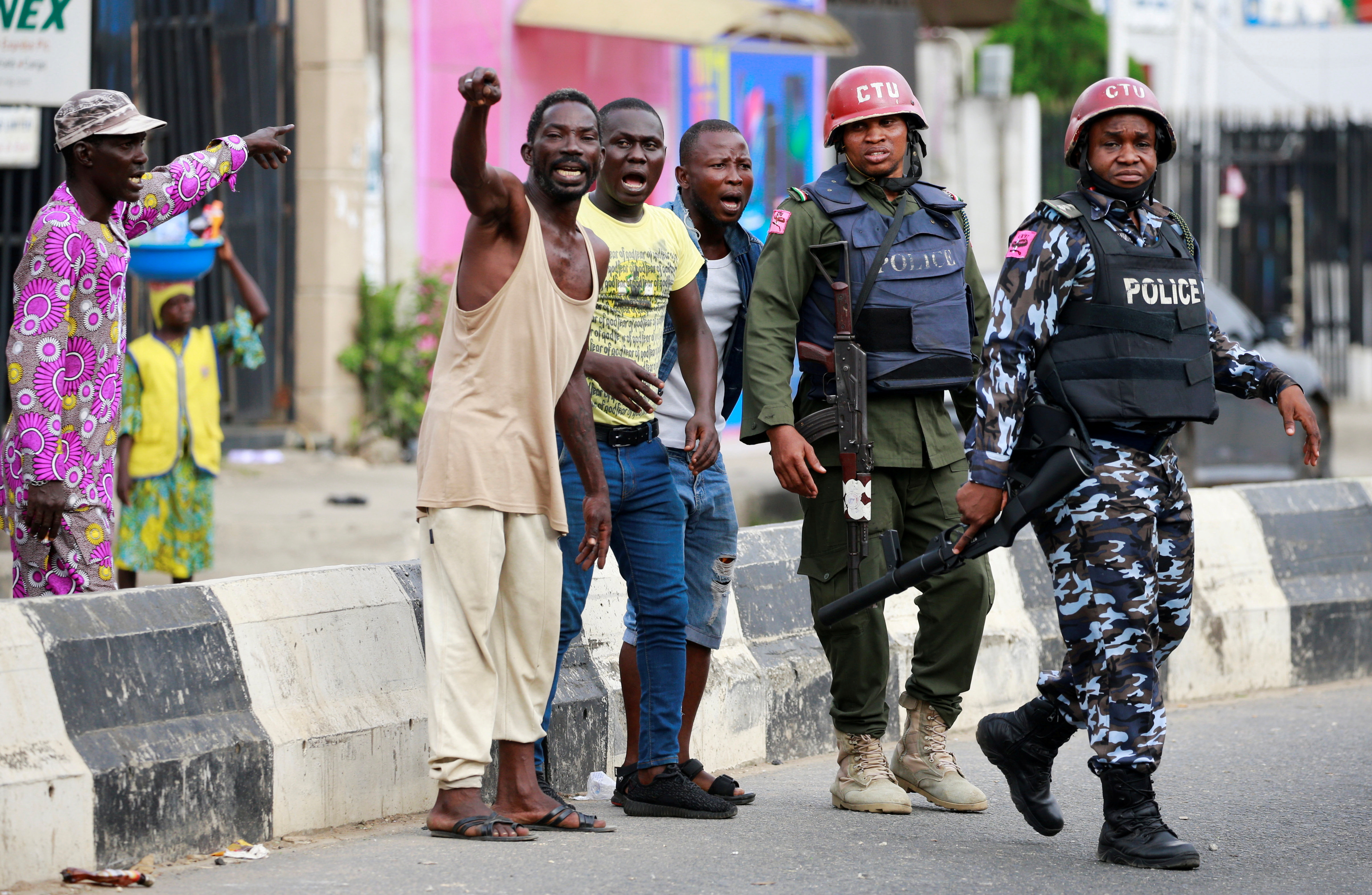 Government officials have issued statements urging looters to stay away from warehouses [Afolabi Sotunde/Reuters]