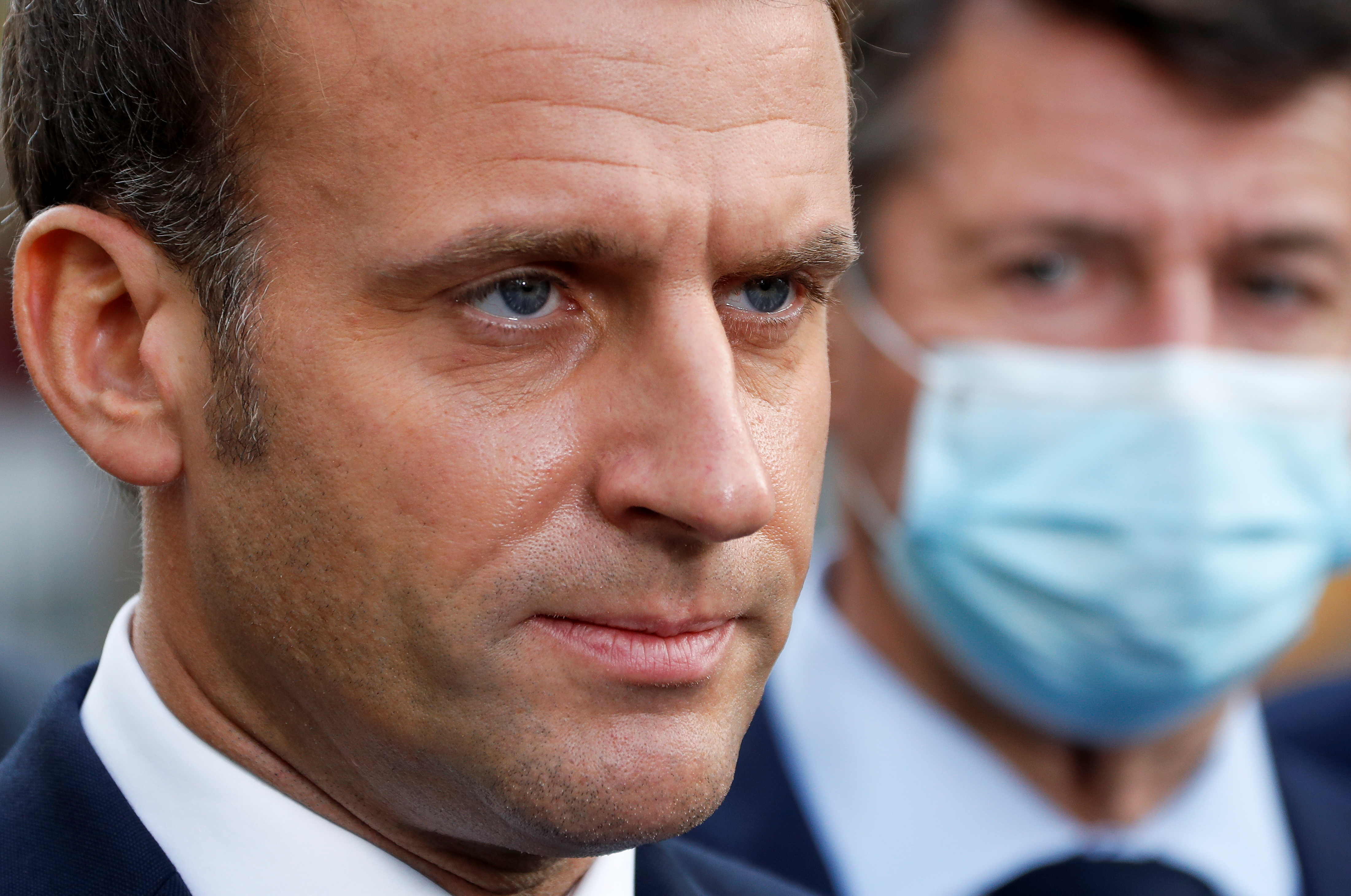 French President Emmanuel Macron looks on as he speaks to the media during the visit to the scene of a knife attack at Notre Dame church in Nice, France October 29, 2020. [Eric Gaillard/Reuters]