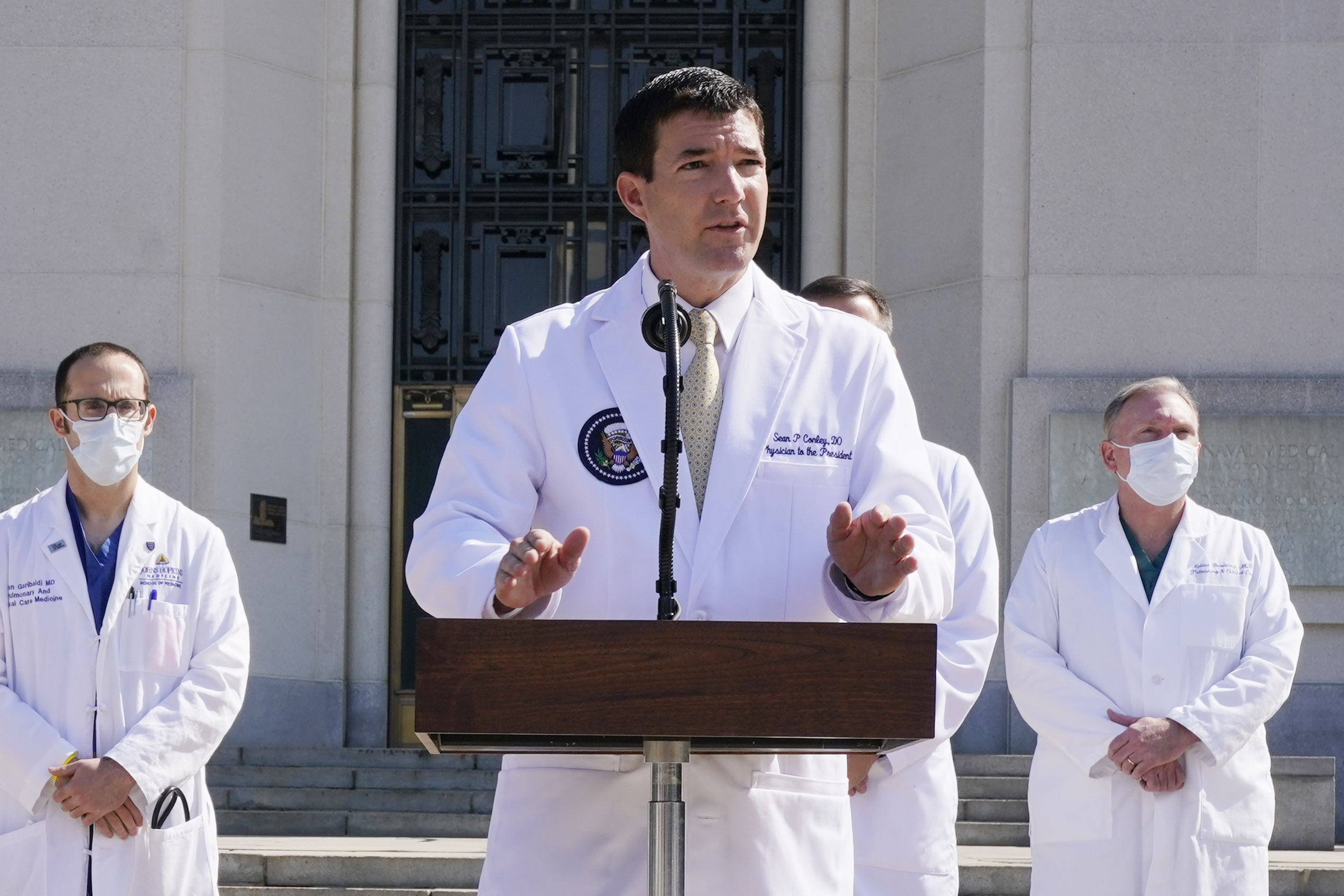 Dr Sean Conley, physician to President Donald Trump, briefs reporters at Walter Reed National Military Medical Center [Jacquelyn Martin/The Associated Press]