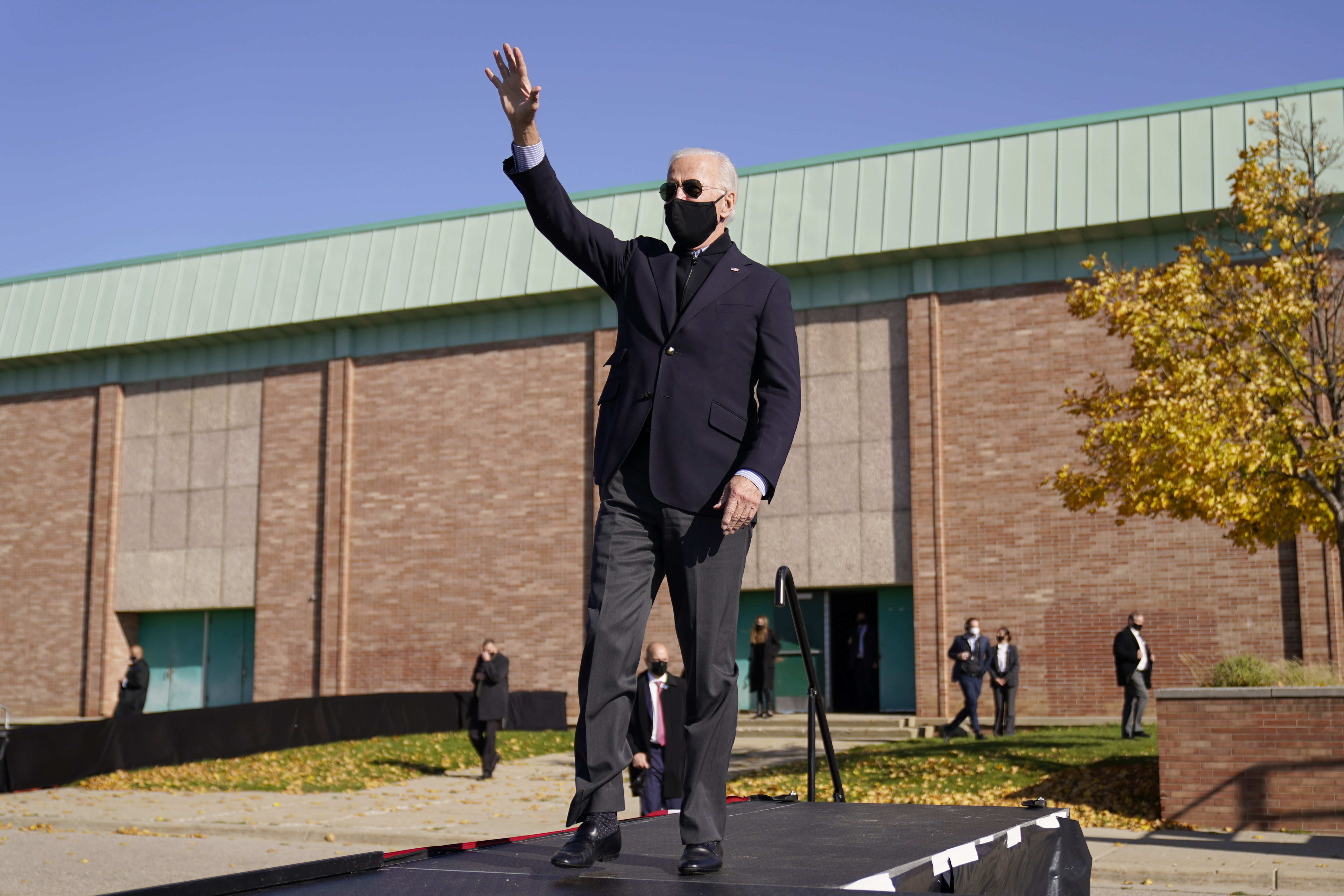 The Democratic United States presidential candidate, former Vice President Joe Biden, arrives to speak at a rally with former President Barack Obama in Flint, Michigan on October 31 [File: AP Photo/Andrew Harnik]