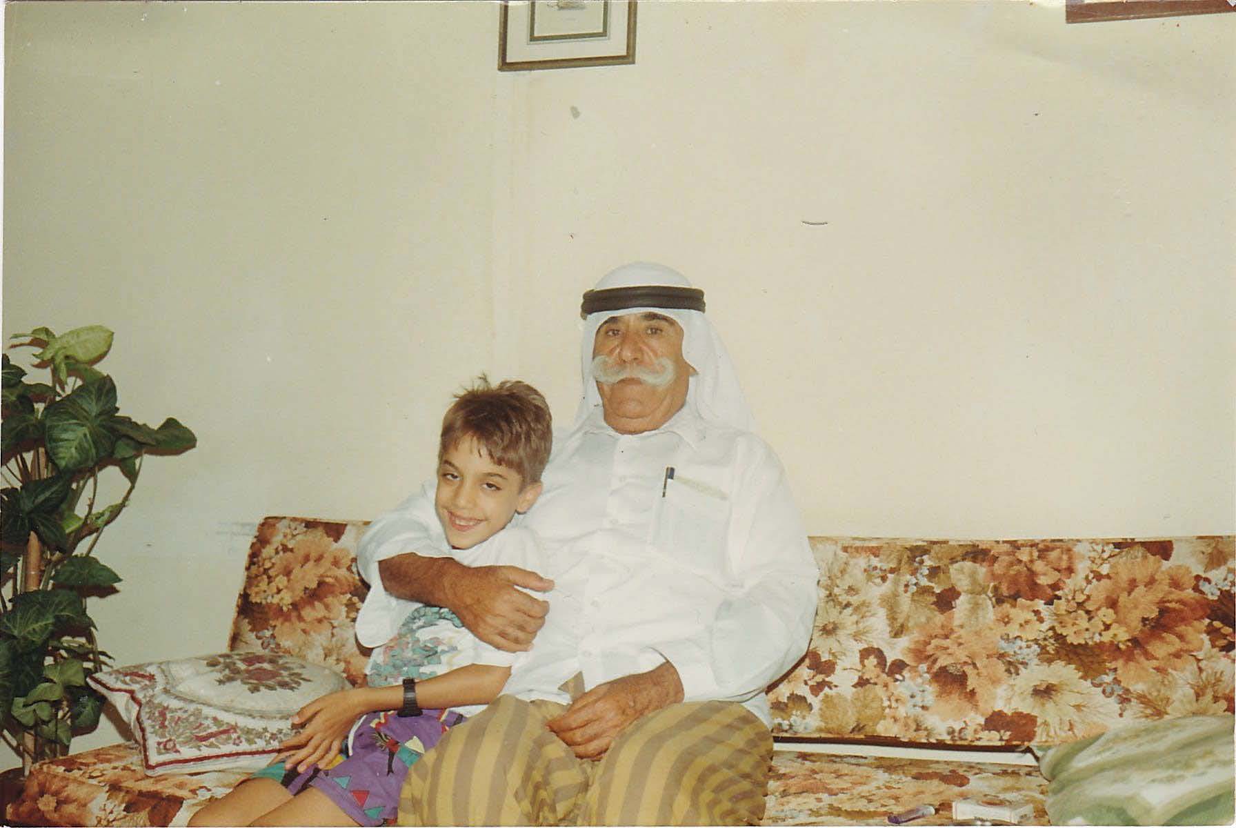 The writer with his grandfather in Lebanon [Photo courtesy of Ahmad Moussa]