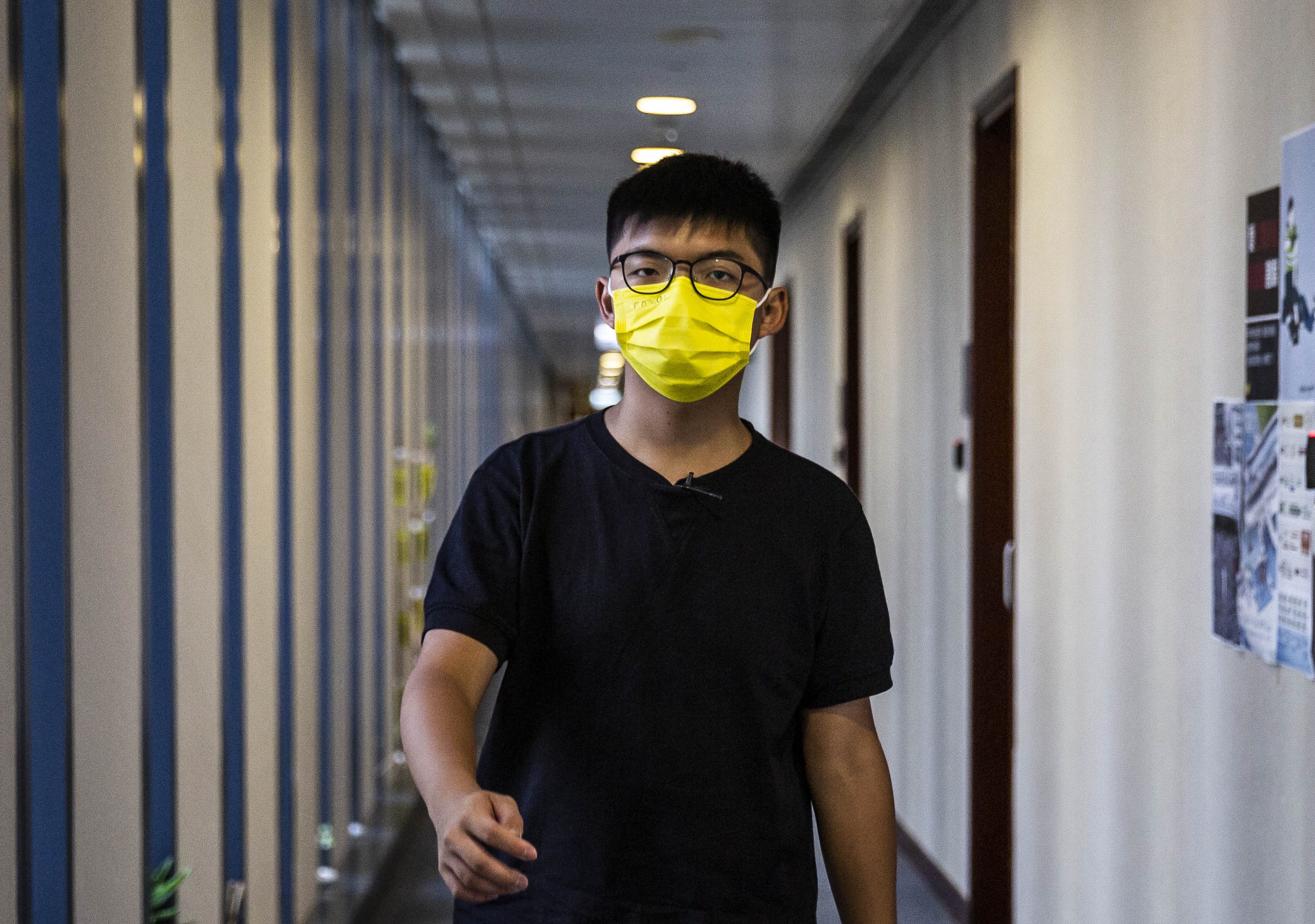 High-profile activist Joshua Wong faces as long as three years in prison when he is sentenced on Wednesday [File: Isaac Lawrence/AFP].