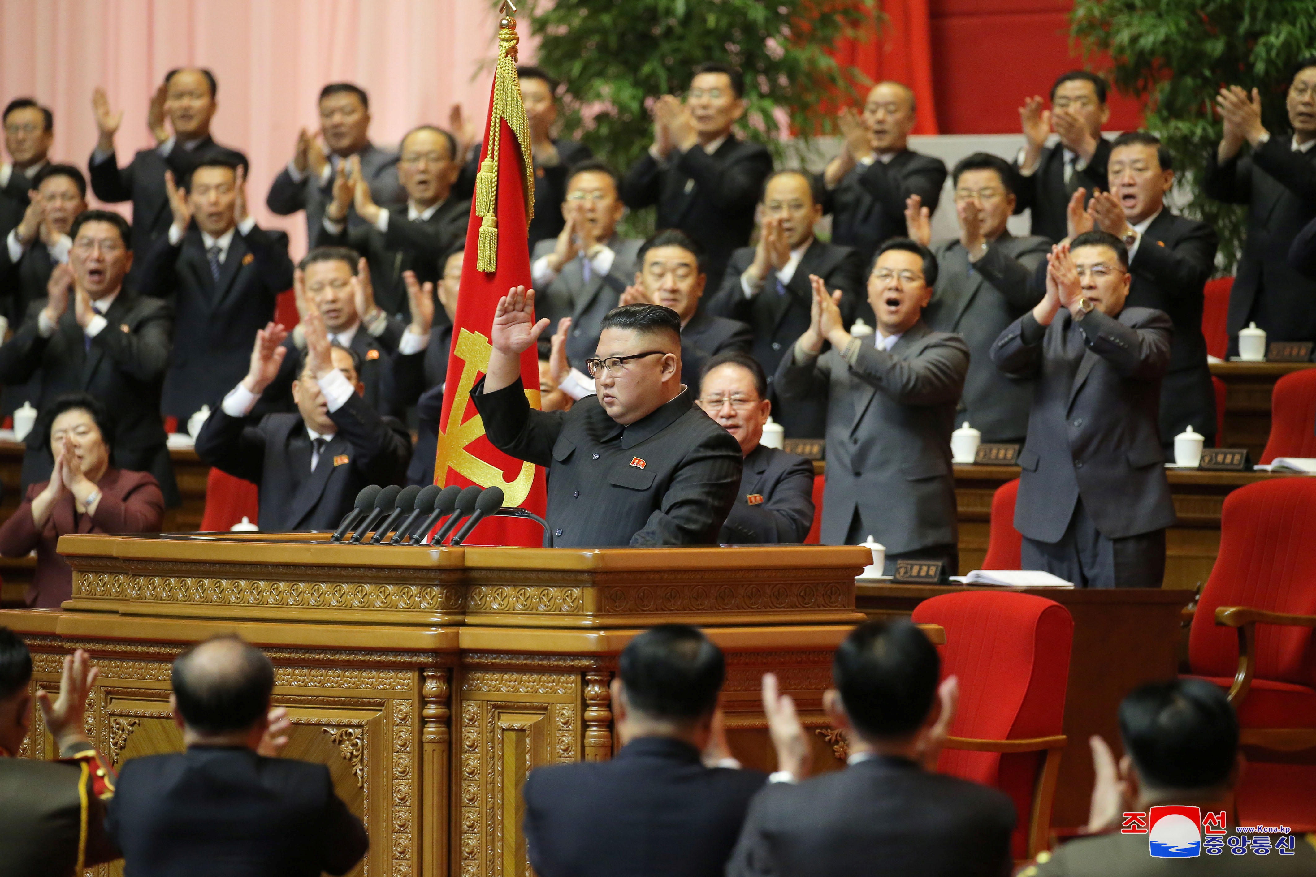 North Korean leader Kim Jong Un acknowledges the applause during the 8th Congress of the Workers&#39; Party in Pyongyang. Kim pledged to develop the country&#39;s nuclear weapons, but also acknowledged severe economic problems [KCNA via Reuters]
