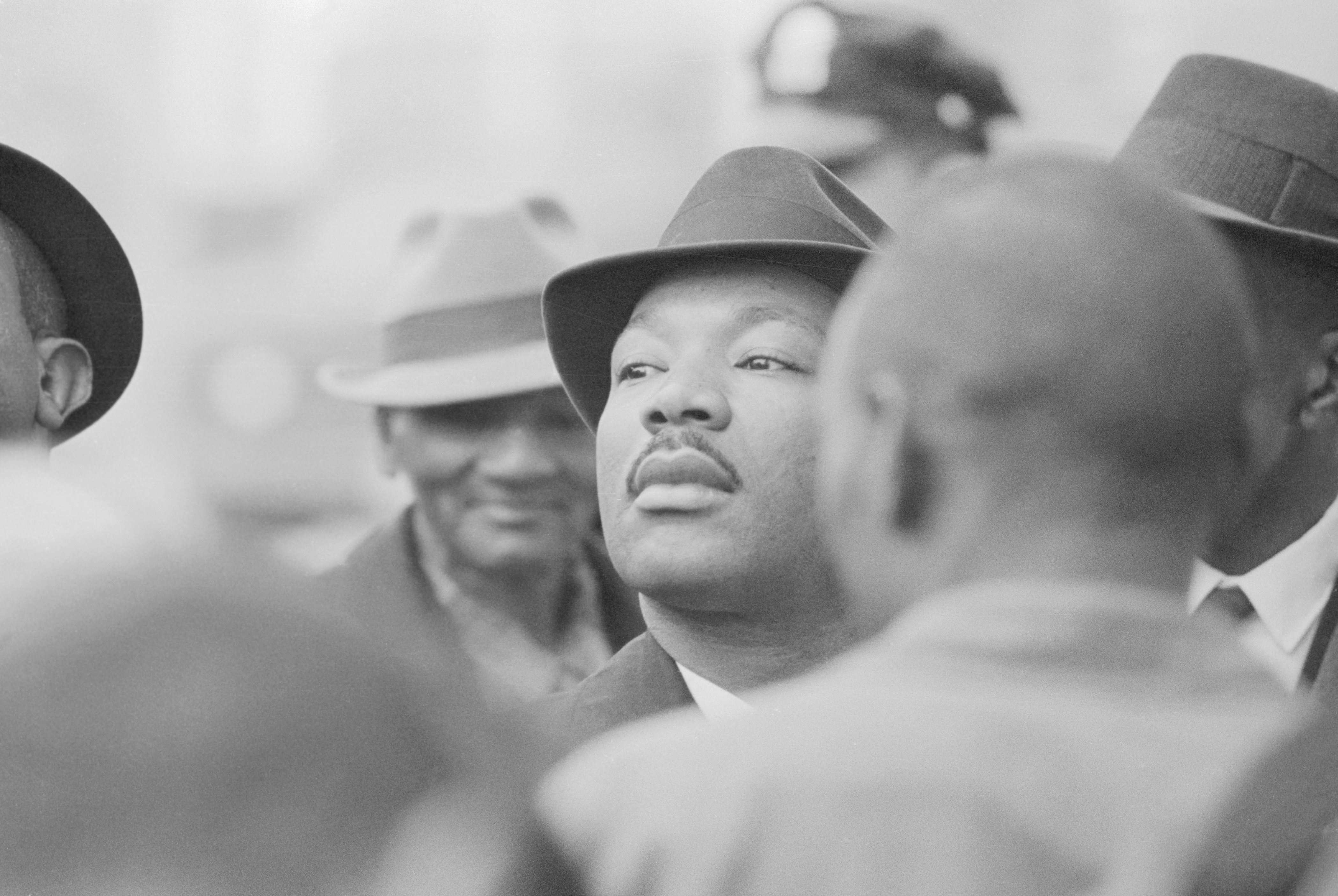 Dr Martin Luther King, Jr stands with fellow demonstrators as they are arrested for parading without a permit in Selma, Alabama in 1965 [Getty Images]